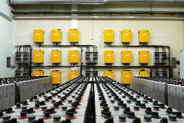 Equipment Room with Sunny Island battery inverters and batteries