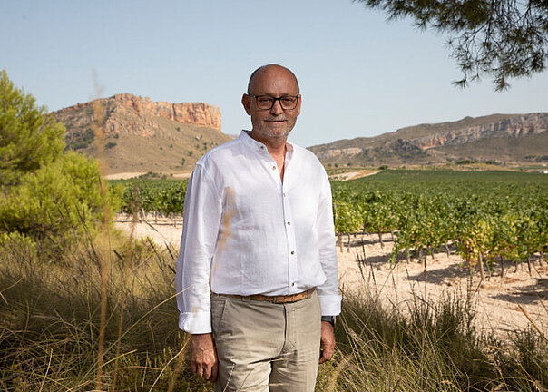 Winemaker Álvaro Gil Vera, with his grapevines in the background